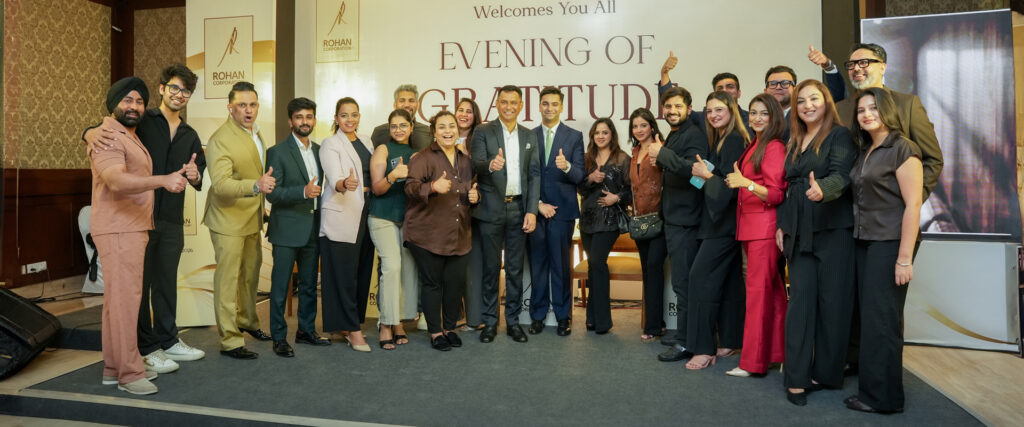 Rohan Corporation team with Dr Rohan Monteiro and Dion Monteiro alongside guests at Evening of Gratitude 2026 in Mangaluru